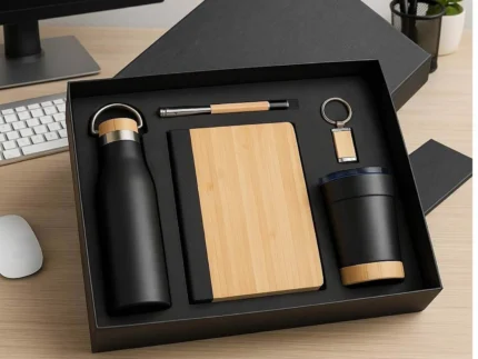 Premium black bamboo corporate gift set with bottle, notebook, pen, tumbler and keychain for employee gifting