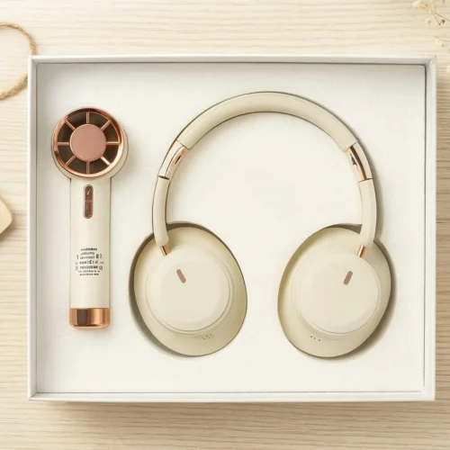 Premium corporate tech gift set with wireless headphones and grooming kit for employee and client gifting